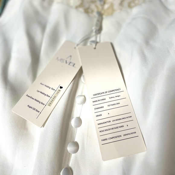 Simple wedding, open lace back and small train. - Picture 2 of 15